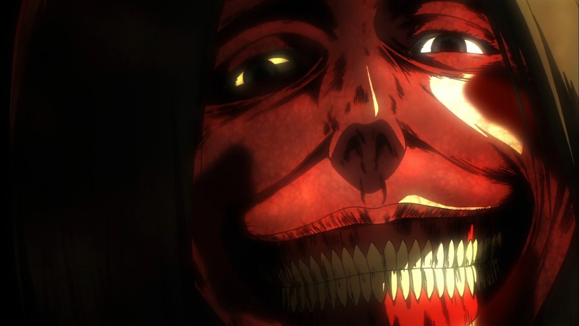 El titán que se comió a la madre de Eren en el primer episodio sonriendo en un primer plano