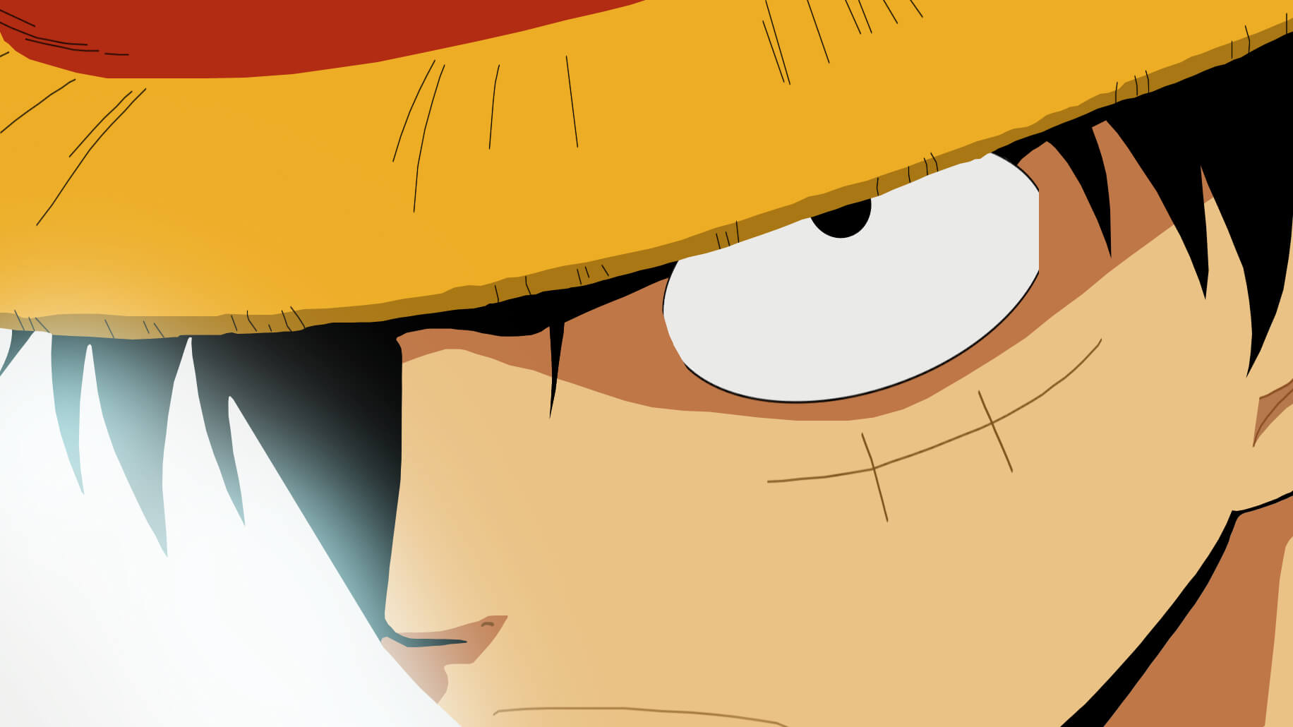 Primer plano del ojo de Luffy con expresión seria y su sombrero de paja